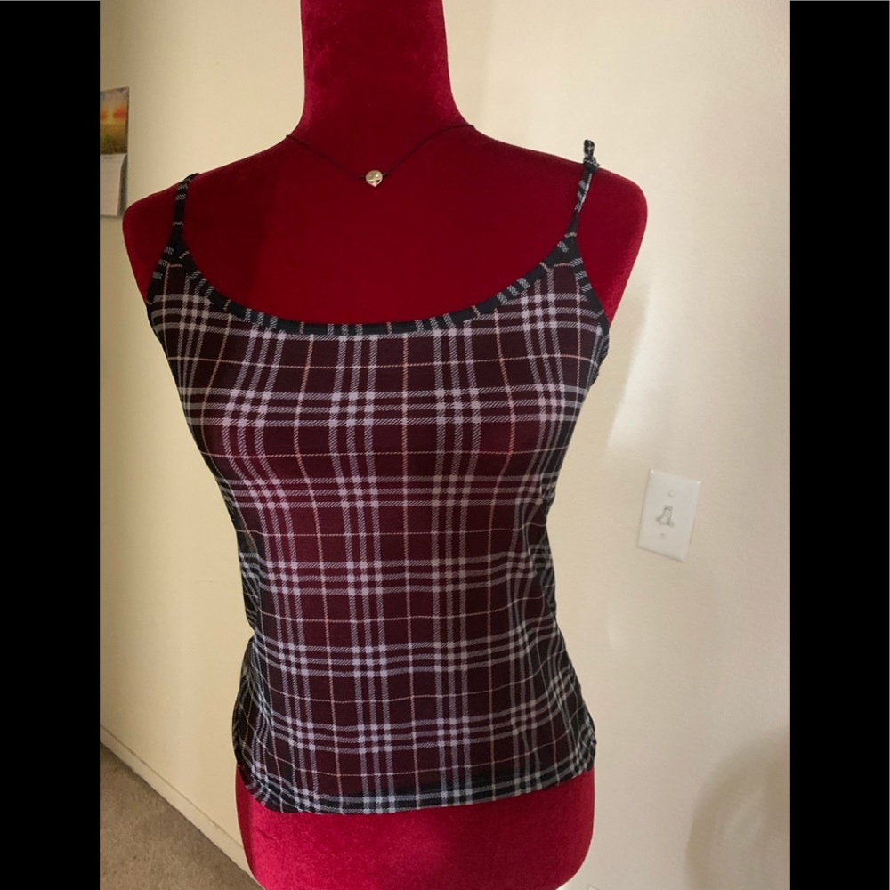 Burberry tank top size Large but fits like a small